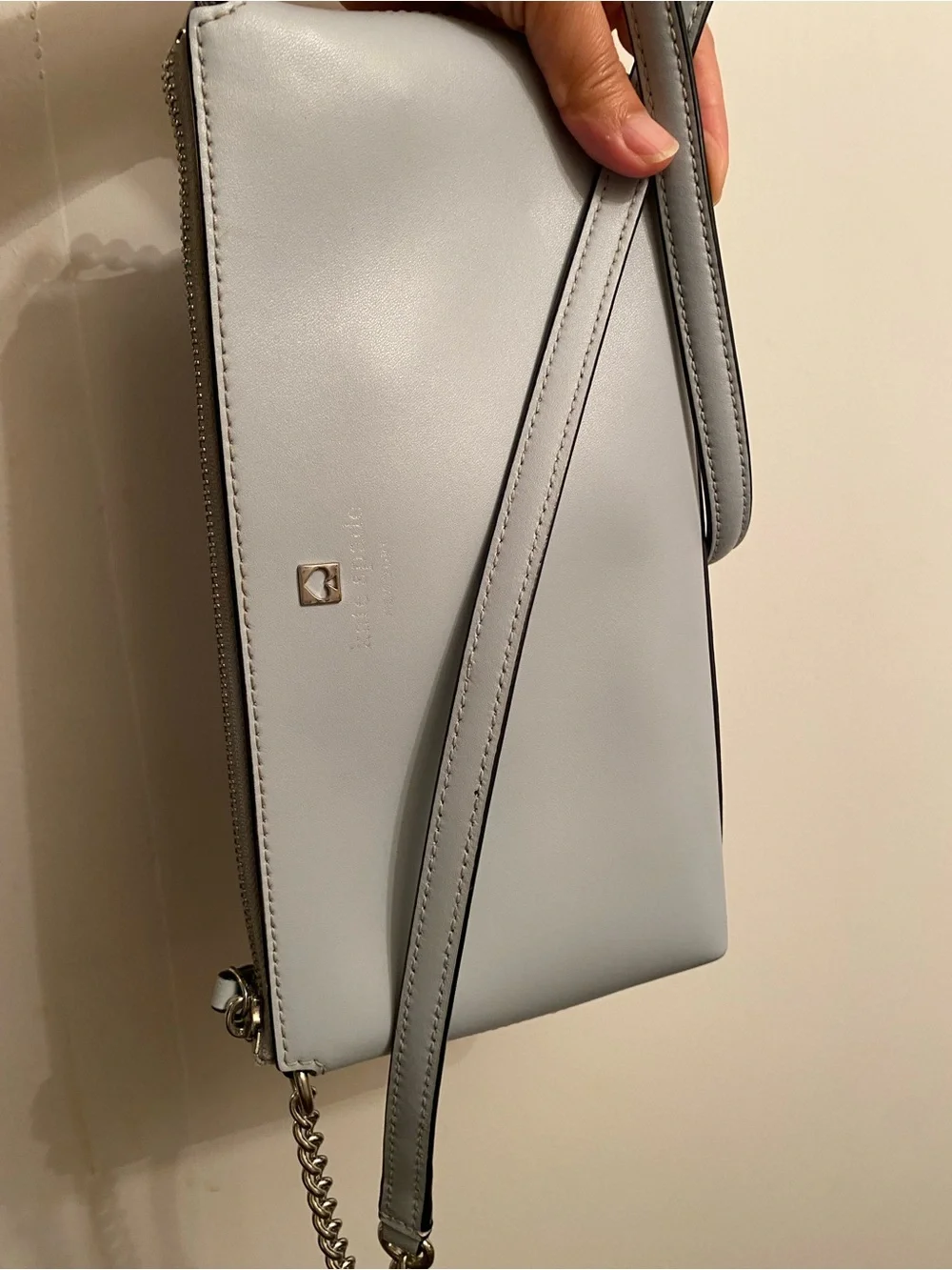 Kate Spade light gray leather crossbody bag with gold spade logo